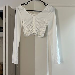 White long sleeve cropped top